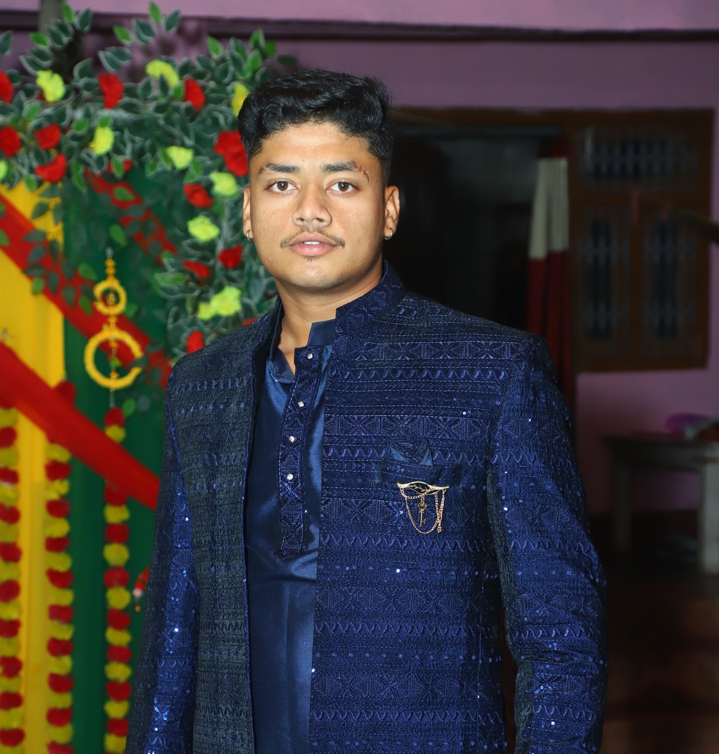 Indian operations manager in safety gear overseeing water bottling plant operations with modern equipment 